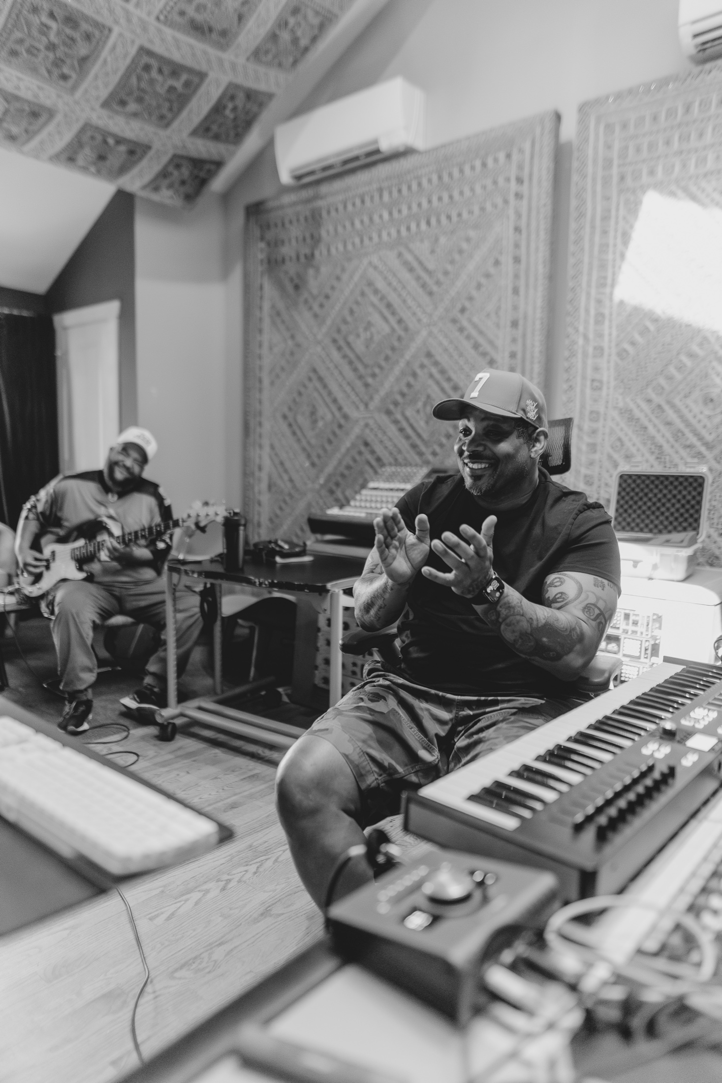 WLPWR coaching a producer during a collaborative studio session
